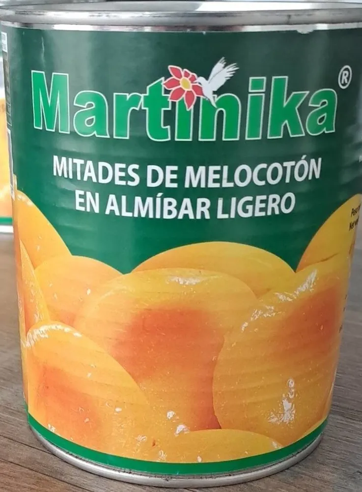 Mitades de melocotón en almíbar ligero