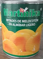 Mitades de melocotón en almíbar ligero