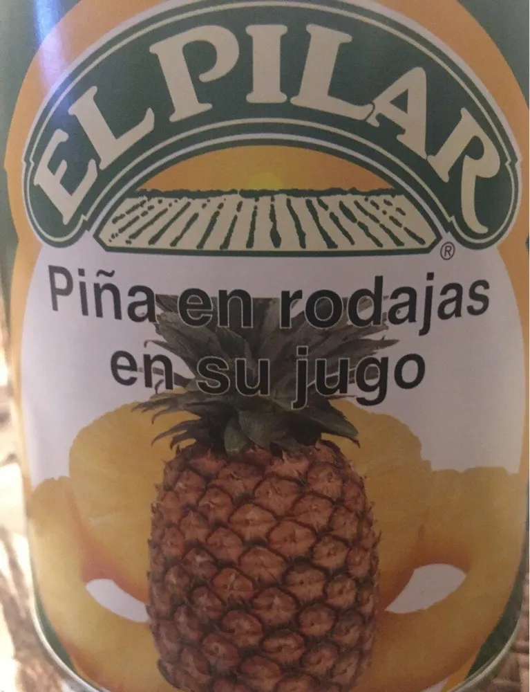 Piña en rodajas en su jugo