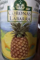 Piñña en rodajas en su jugo