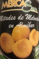 Mitades de melocoton en almibar