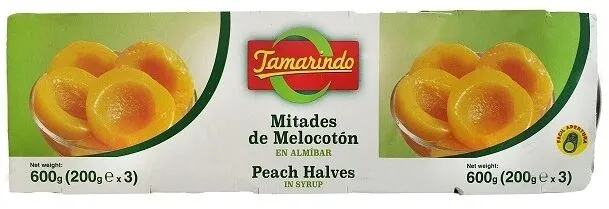 Mitades de melocotón en almíbar