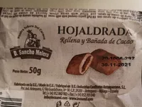 Hojaldrada rellena y bañada de cacao