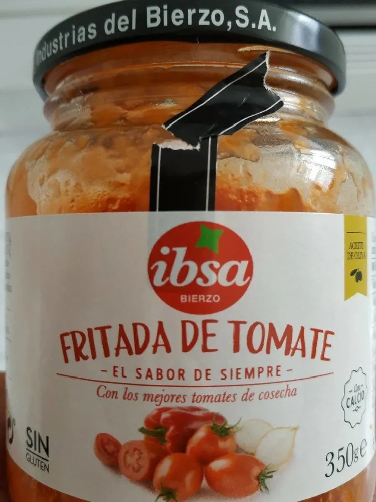 Fritada casera de tomate de cosecha con aceite de oliva