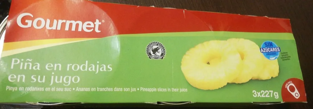 Piña en rodajas en su jugo