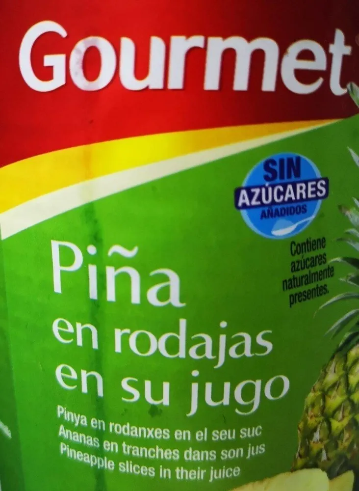 Pina en rodajas en su jugo