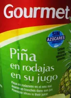 Pina en rodajas en su jugo