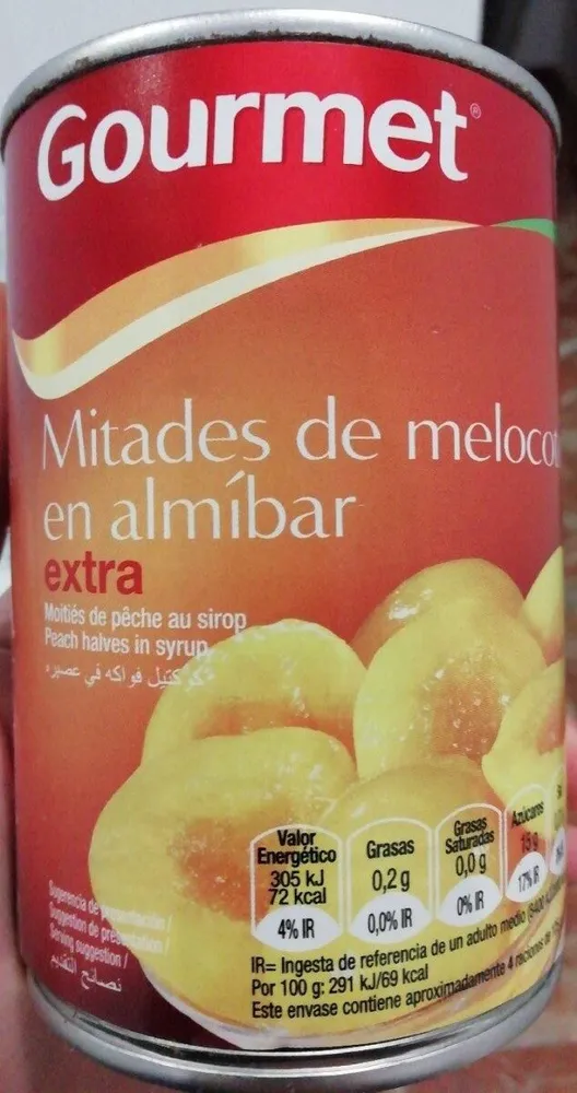 Mitades de melocotón en almíbar