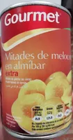 Mitades de melocotón en almíbar