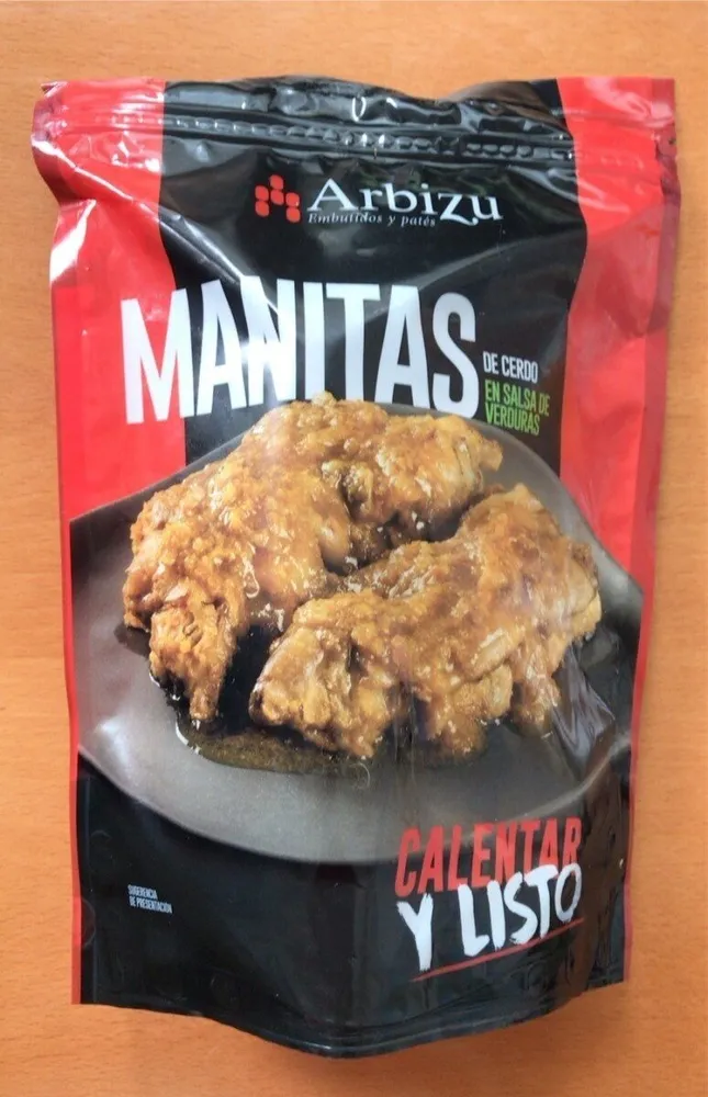 Manitas de cerdo en salsa de verduras