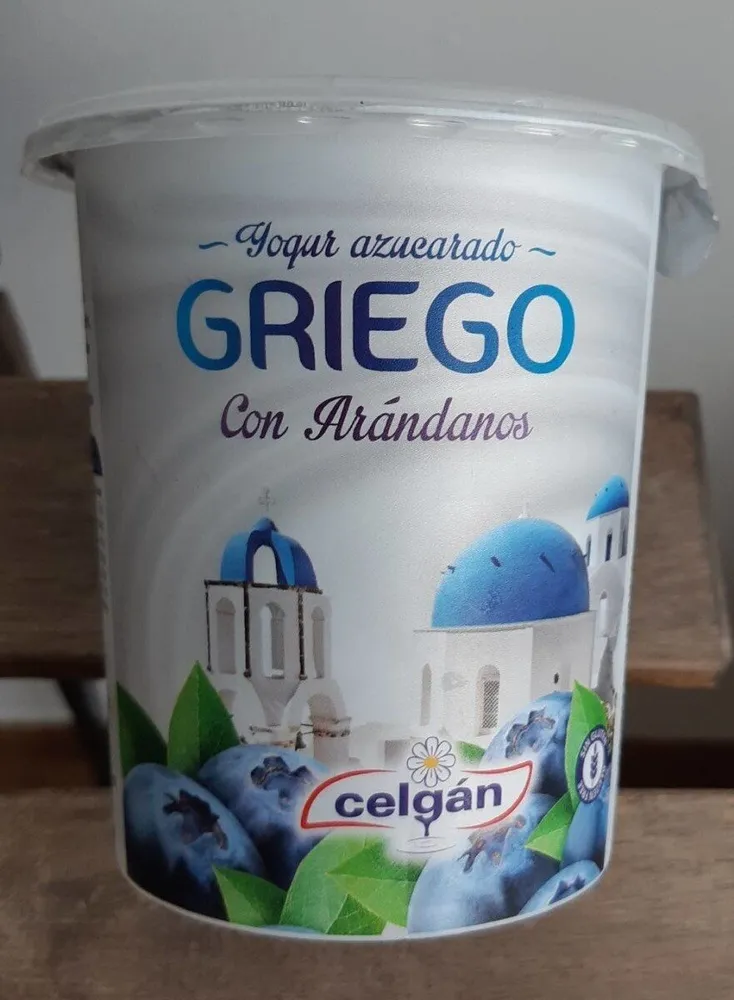 Yogur azucarado griego con arándanos