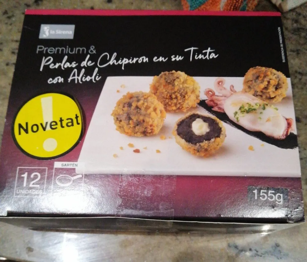 Perlas de chipirón en su tinta con alioli