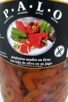Pimientos asados en tiras con leña de olivo en su jugo