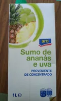 Zumo de piña y uva