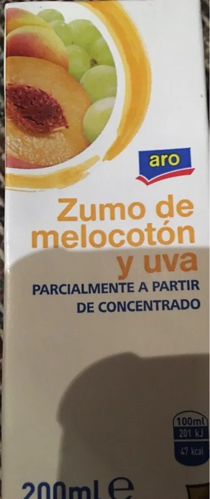 Zumo de melocoton y uva
