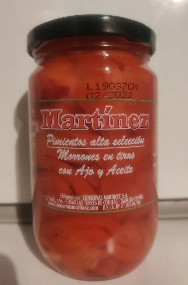 Pimientos en tiras con ajoy aceite
