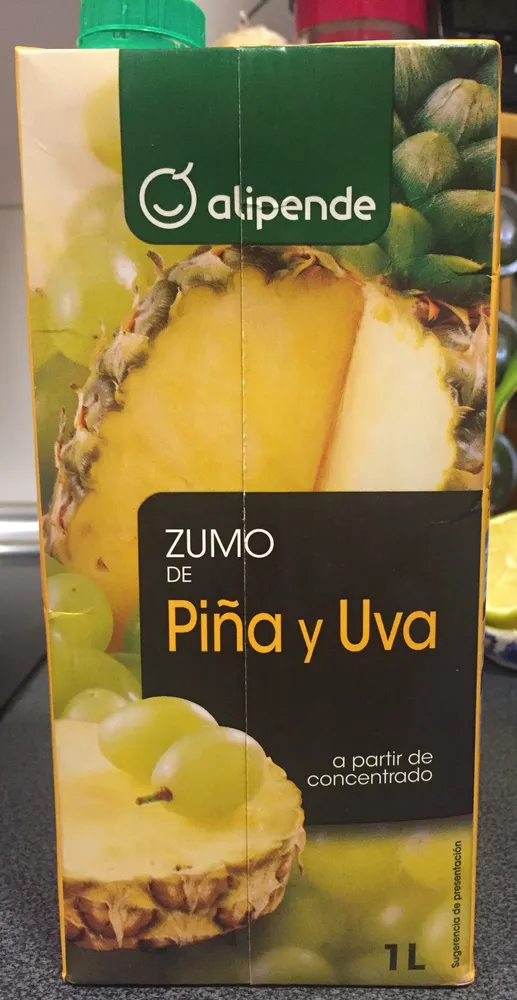 Zumo de piña y uva