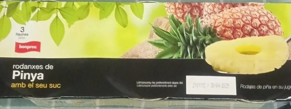 Rodanxes de pinya amb el seu suc