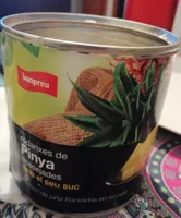 Rodajas de piña troceadas en su jugo