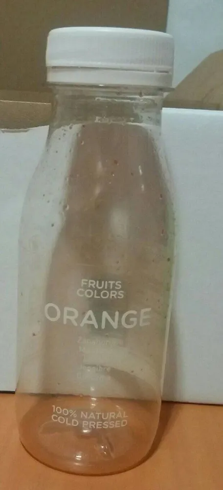 Zumo naranja, manzana, limón, gengibre y cúrcuma