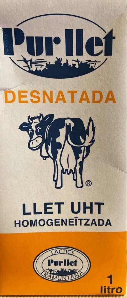 Llet UHT desnatada homogeneïtzada
