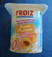 Yogur desnatado con trozos de melocotón