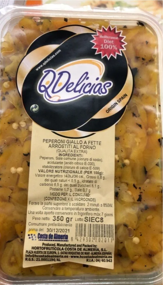 Peperoni giallo a fette cotti al forno