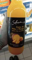 Jus d'ananas et mangue. 100% pur fruit préssé