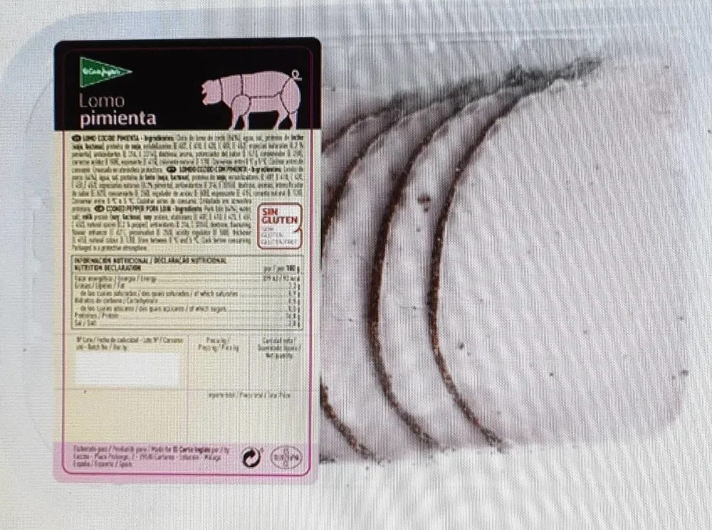 Lomo cocido a la pimienta de cerdo en filetes