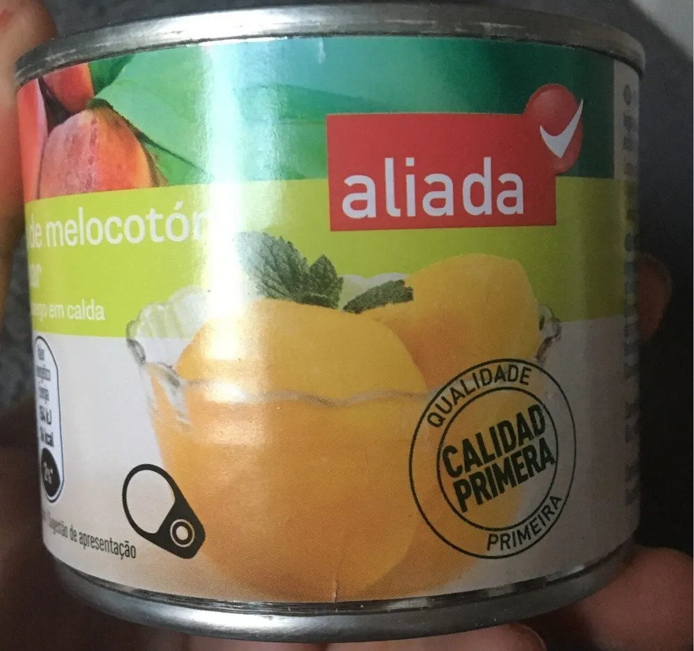 mitades de melocoton en almibras