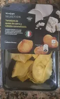 Tortelloni de queso de cabra y cebolla caramelizada