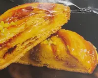 Trenza de dulce de leche y pistachos