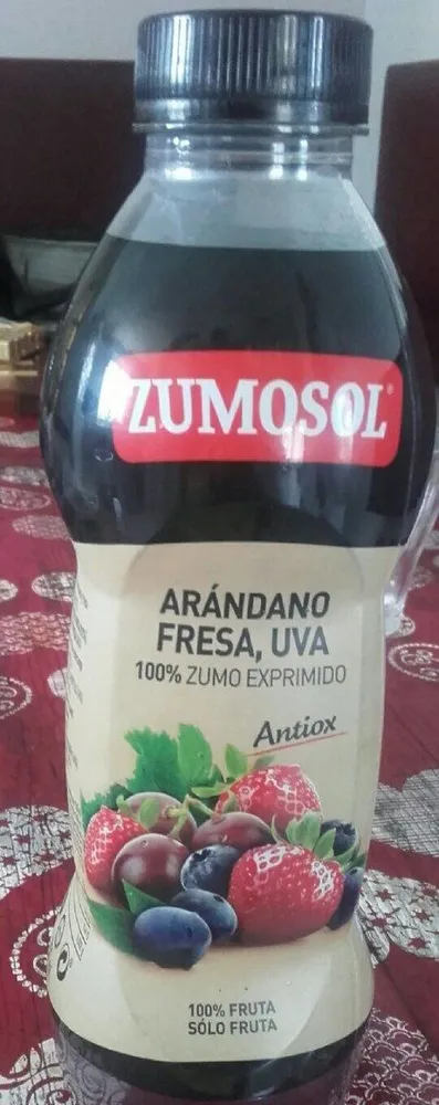 100% zumo exprimido de arándano, fresa y uvas