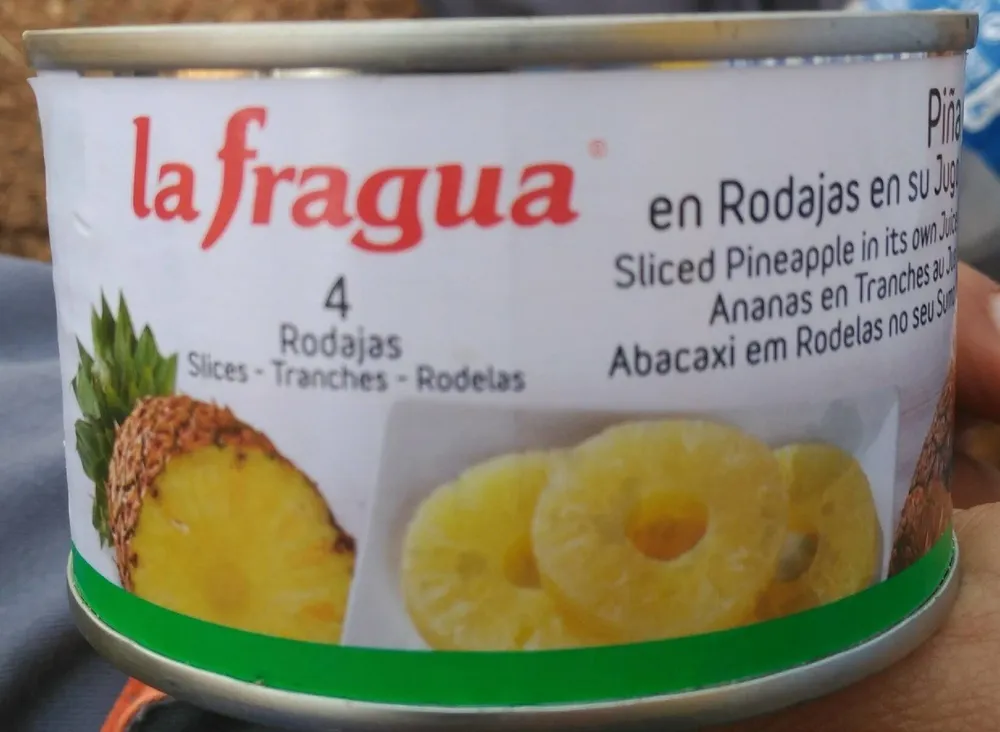 Piña en rodajas en su jugo
