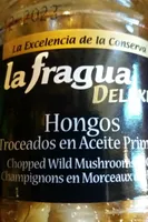 Hongos troceados en aceite de primera