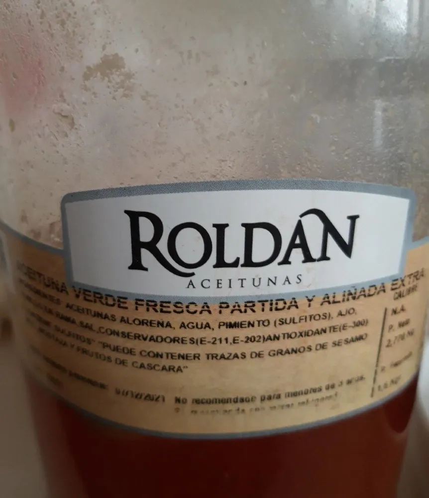 Aceituna verde fresca partida y aliñadas