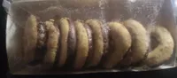 Rosquitos de naranja bañados con cacao