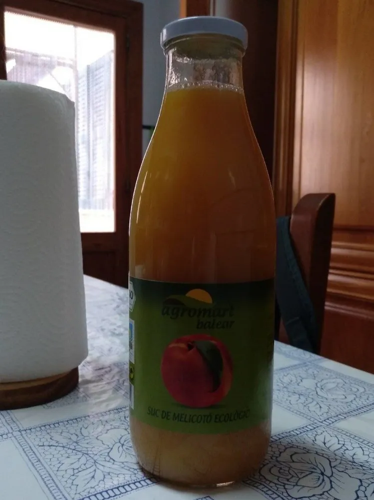 Suc de melicotó ecològic