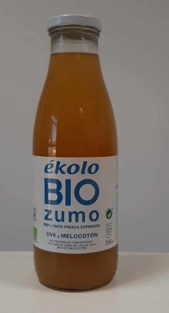 Zumo de melocotón y uva