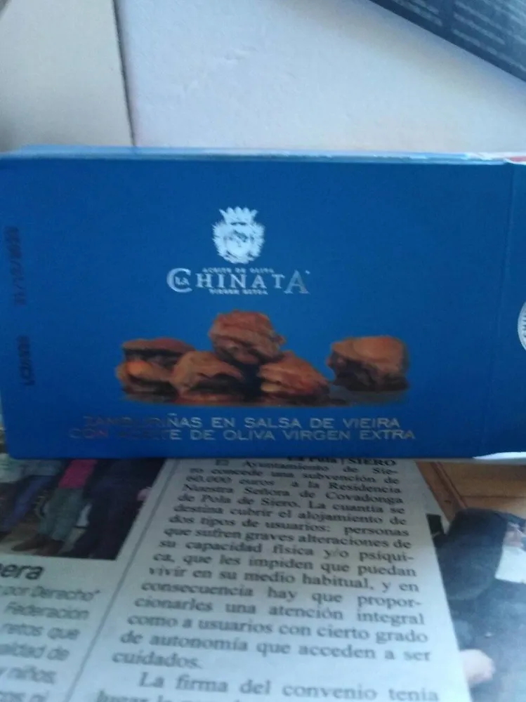 Zamburiñas en salsa de vieira con aceite de oliva virgen extra