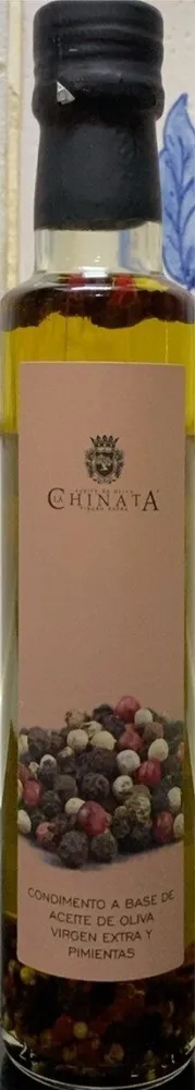 Condimiento a base de aceite de oliva virgen extra y pimientas