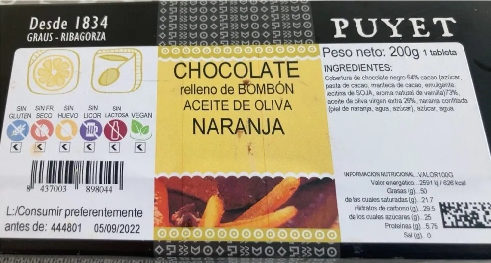 Chocolate relleno de bombón con aceite de oliva y naranja