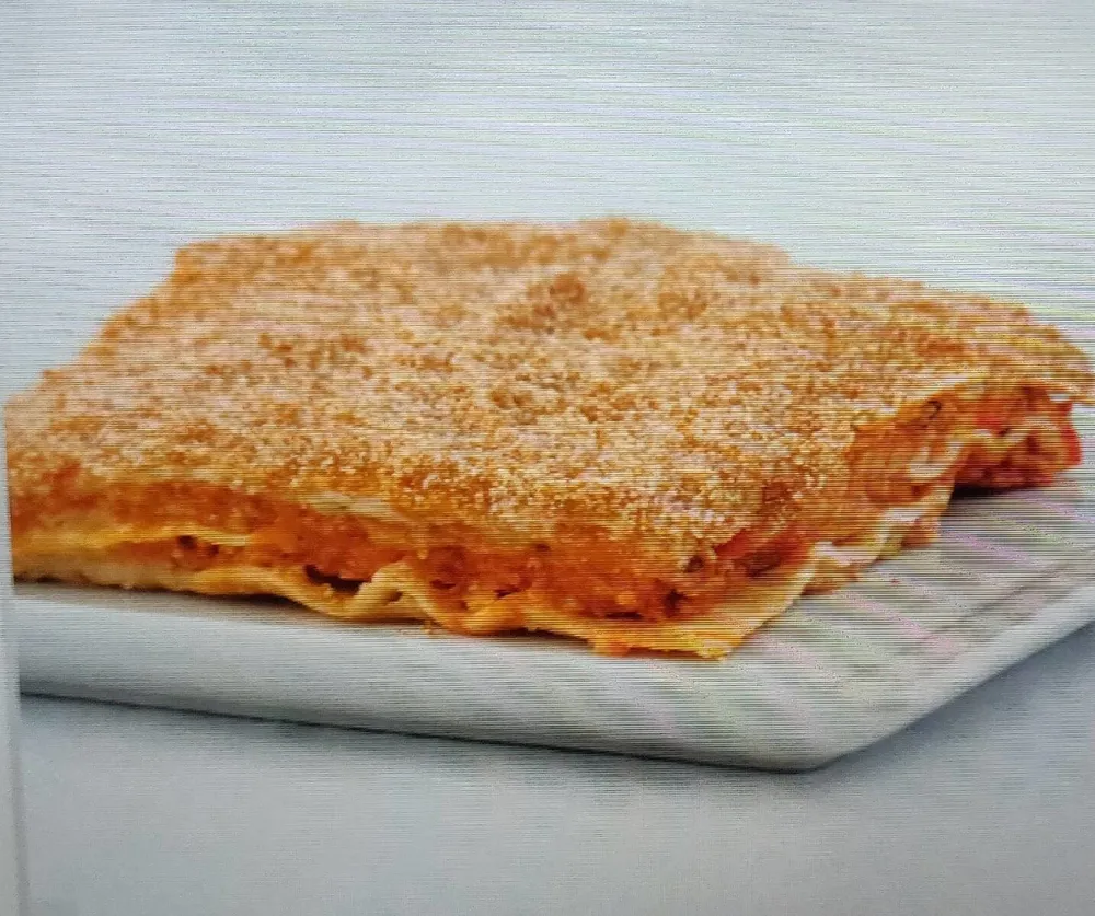 Lasaña vegana de soja, vegetales, lenteja roja y bechamel