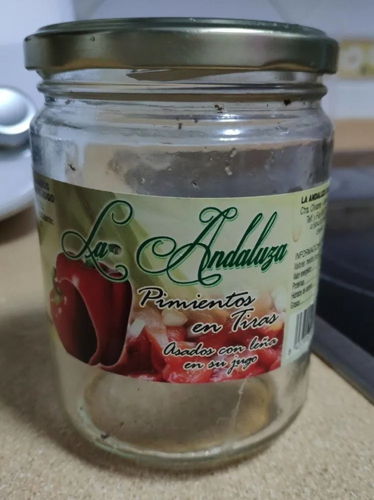 Pimientos en tiras asados en leña en su jugo
