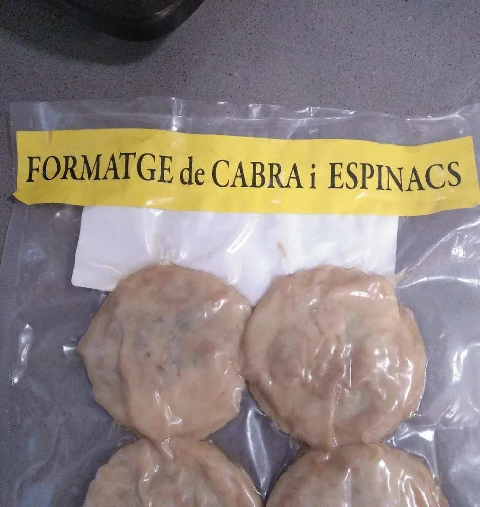 Patatas rellenas de espinacas i queso cabra