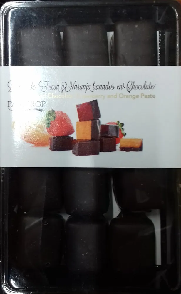 Dulce de fresa y naranja bañados en chocolate