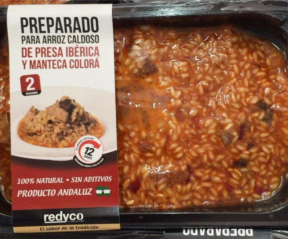 Arroz caldoso de presa iberica y manteca colora