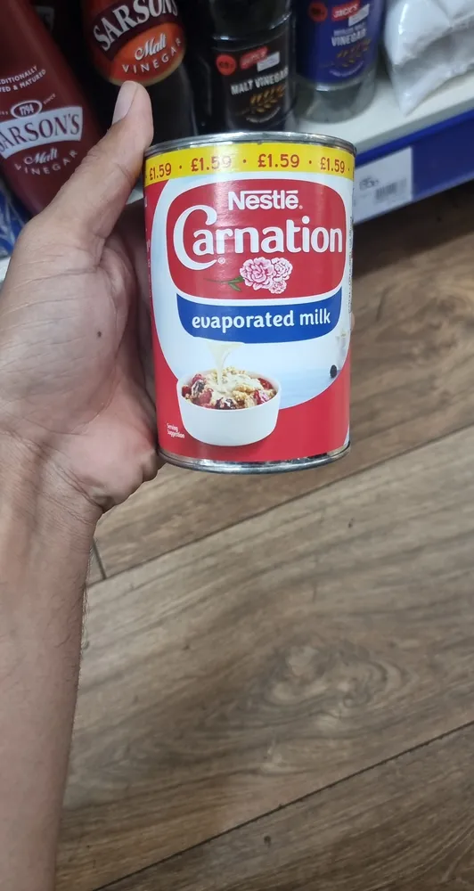 NESTLE CARNATION  EVAPORATED MILK 410G