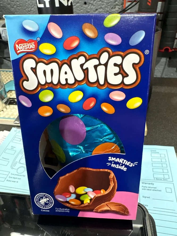 Milk chocolate egg containing SMARTIES