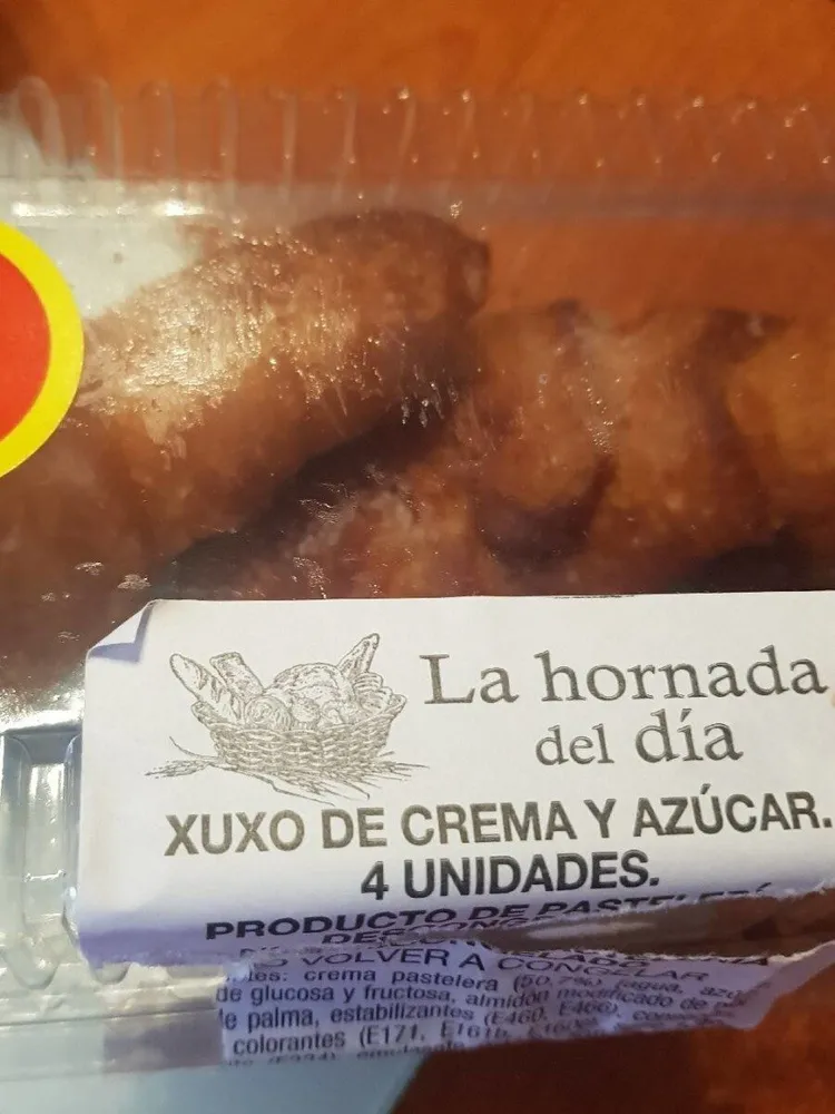 Xuxo de crema y azúcar